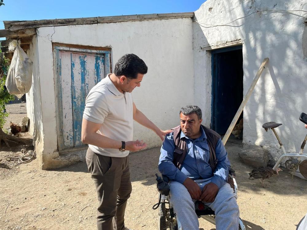 Kars MHP’den ihtiyaç sahibi aileye yardım eli