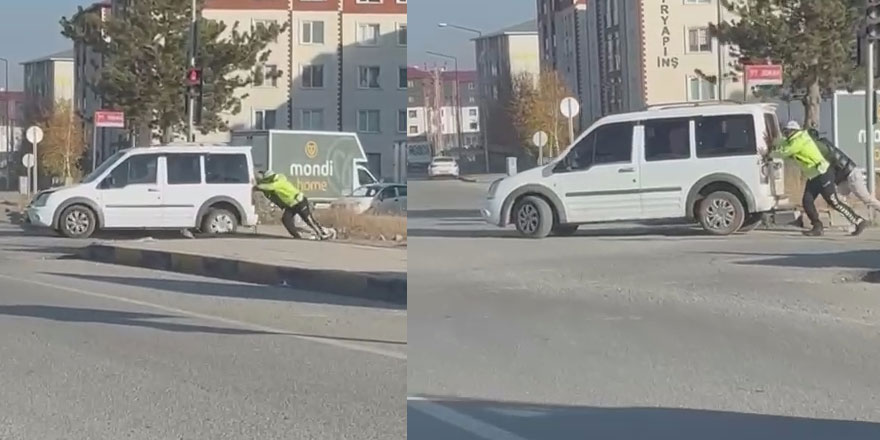 Kars’ta arızalanan araca trafik polisinden örnek davranış