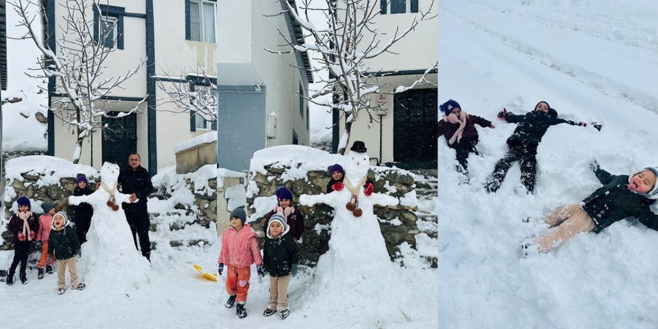 Hakkarili çocukların kardan adam sevinci