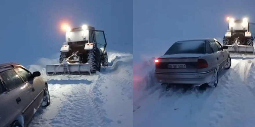 Kars’ta kara saplanan aracı vatandaş traktörüyle kurtardı