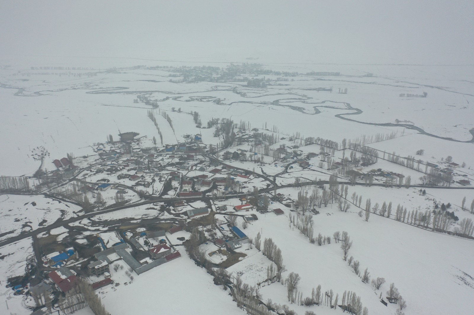 Kars’ta kar altındaki köyler havadan görüntülendi