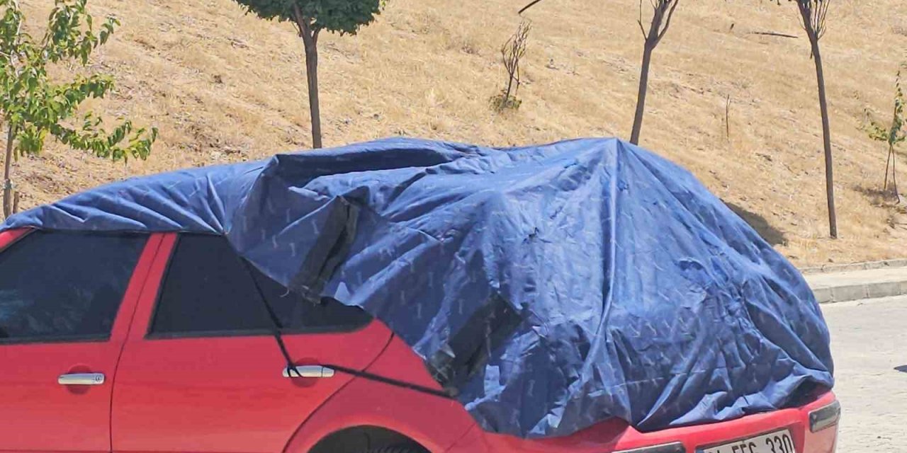 Elazığ’da araç sahiplerinden güneşe karşı önlem