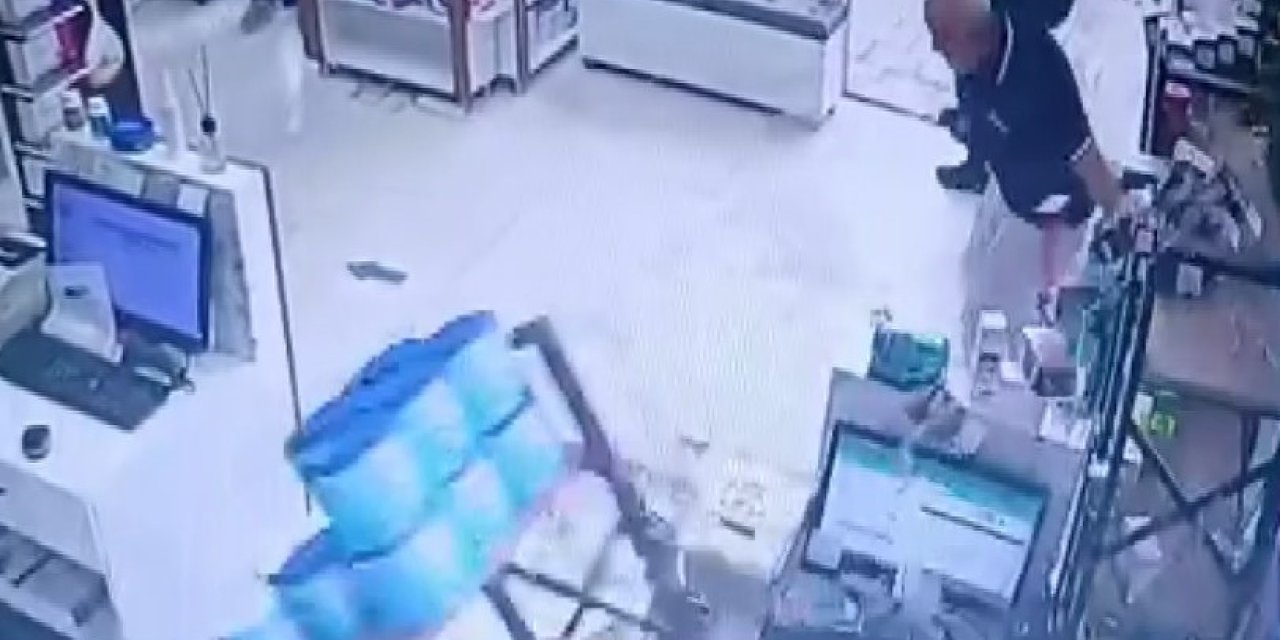 Fırtınada camları patlayan eczanedeki panik anları kameraya yansıdı