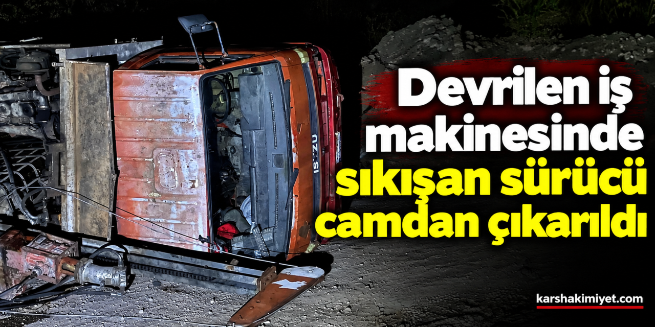 Devrilen iş makinesinde sıkışan sürücü camdan çıkarıldı
